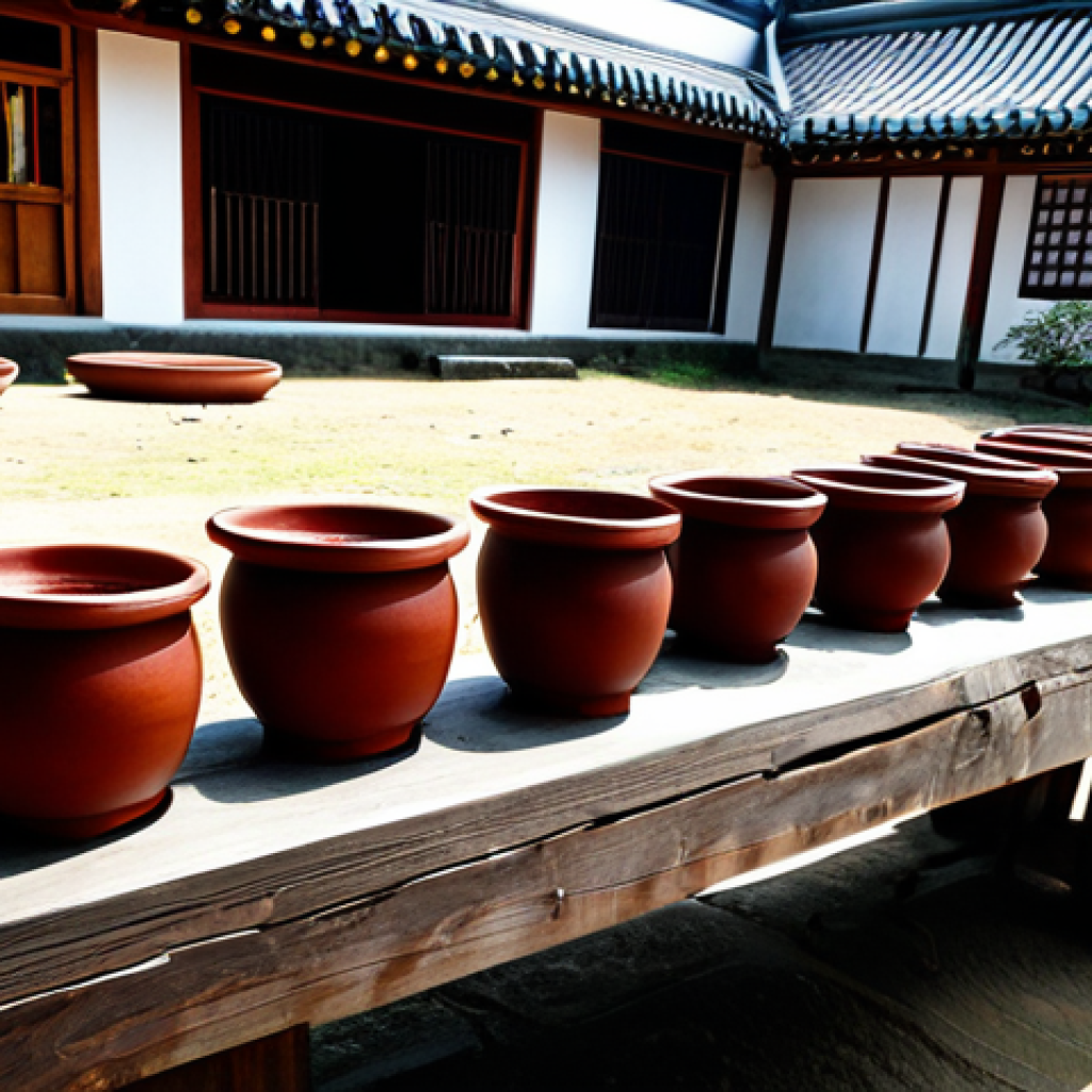 A serene scene with traditional Korean Jangdokdae clay pots, filled with fermenting Gochujang and Doenjang, bathed in warm, natural sunlight. The pots are arranged neatly in a tranquil outdoor courtyard of a traditional Korean house. Meju blocks (fermented soybean blocks) are visible drying on a simple wooden rack nearby, emphasizing the natural process. The setting evokes a sense of timeless tradition and culinary heritage. This image focuses solely on the objects and environment, with no human figures present. safe for work, appropriate content, fully clothed, modest clothing, professional dress, high quality, family-friendly, perfect anatomy, correct proportions, natural pose, well-formed hands, proper finger count, natural body proportions.
